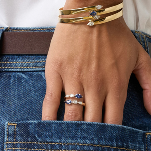 Pear Shape Diamond and Blue Sapphire Graduated Crossover Ring