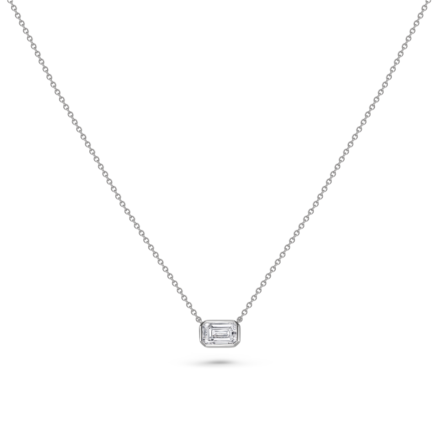 Bezel Set East West Emerald Cut Diamond Pendant