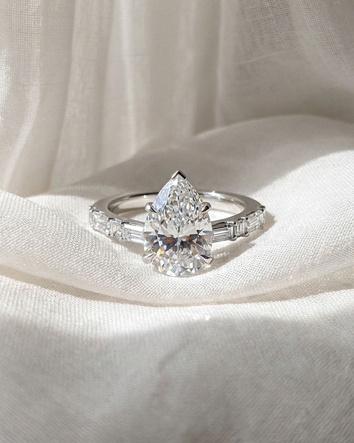 Pear Shape Diamond Ring with Alara and Blaze Cut Band | 3.70tw