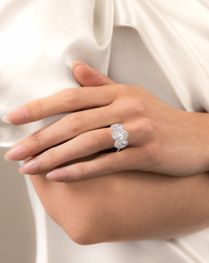 Moval Cut Triple Diamond Ring with Pavé Halo | 3.17tw