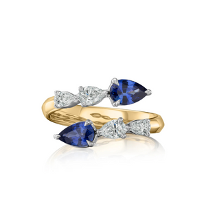 Pear Shape Diamond and Blue Sapphire Graduated Crossover Ring