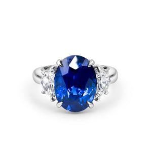 Oval Blue Sapphire 2 Cadillac Diamonds Ring